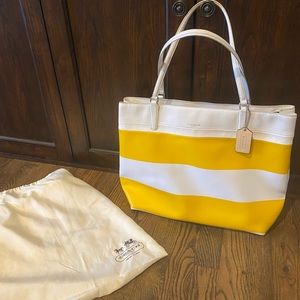 New yellow and white striped Coach bag